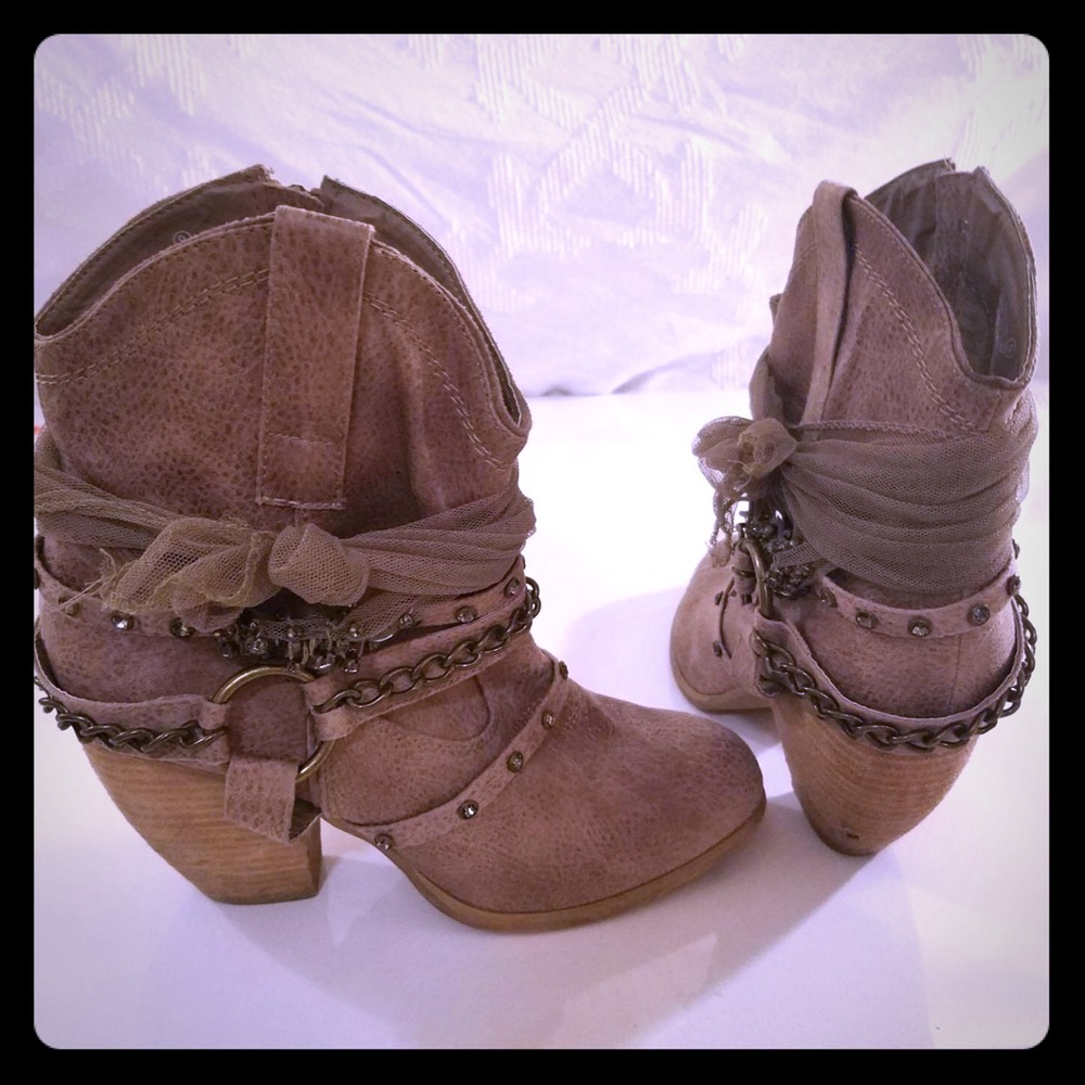 Brown ankle bootie ups with embellishments